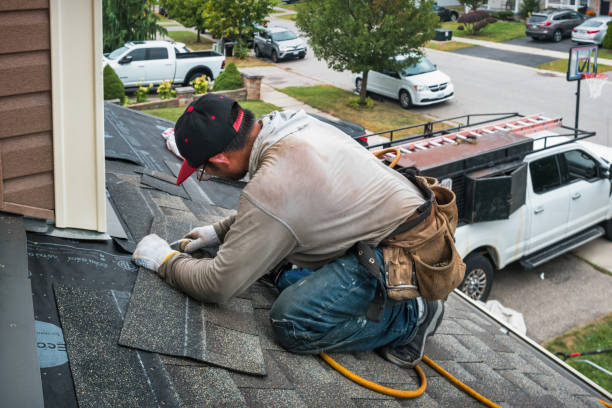 Professional Roofing technician working in Lewiston, ME